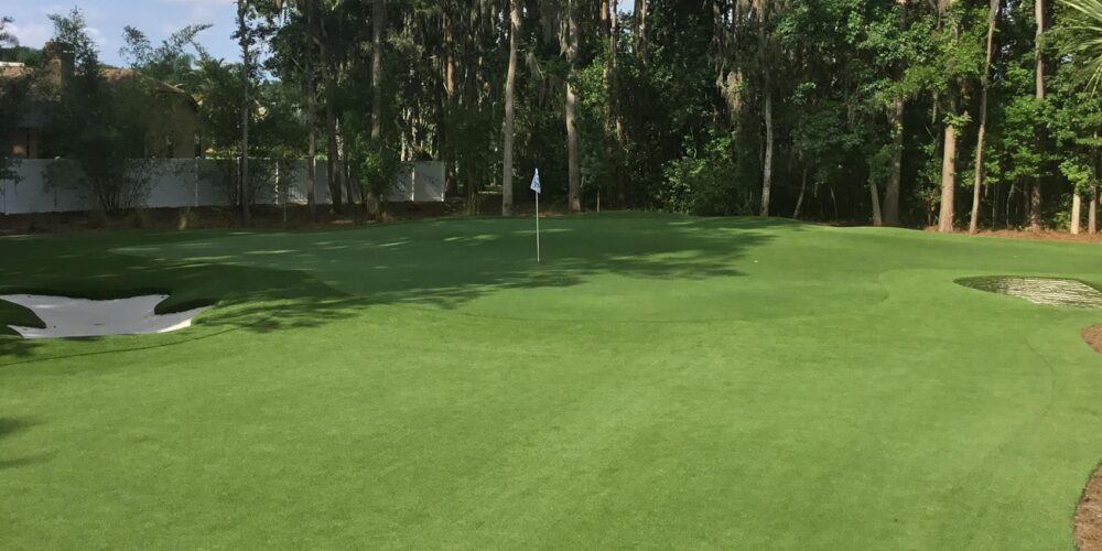 Artificial Turf Putting Green with Stacked Sod Bunkers